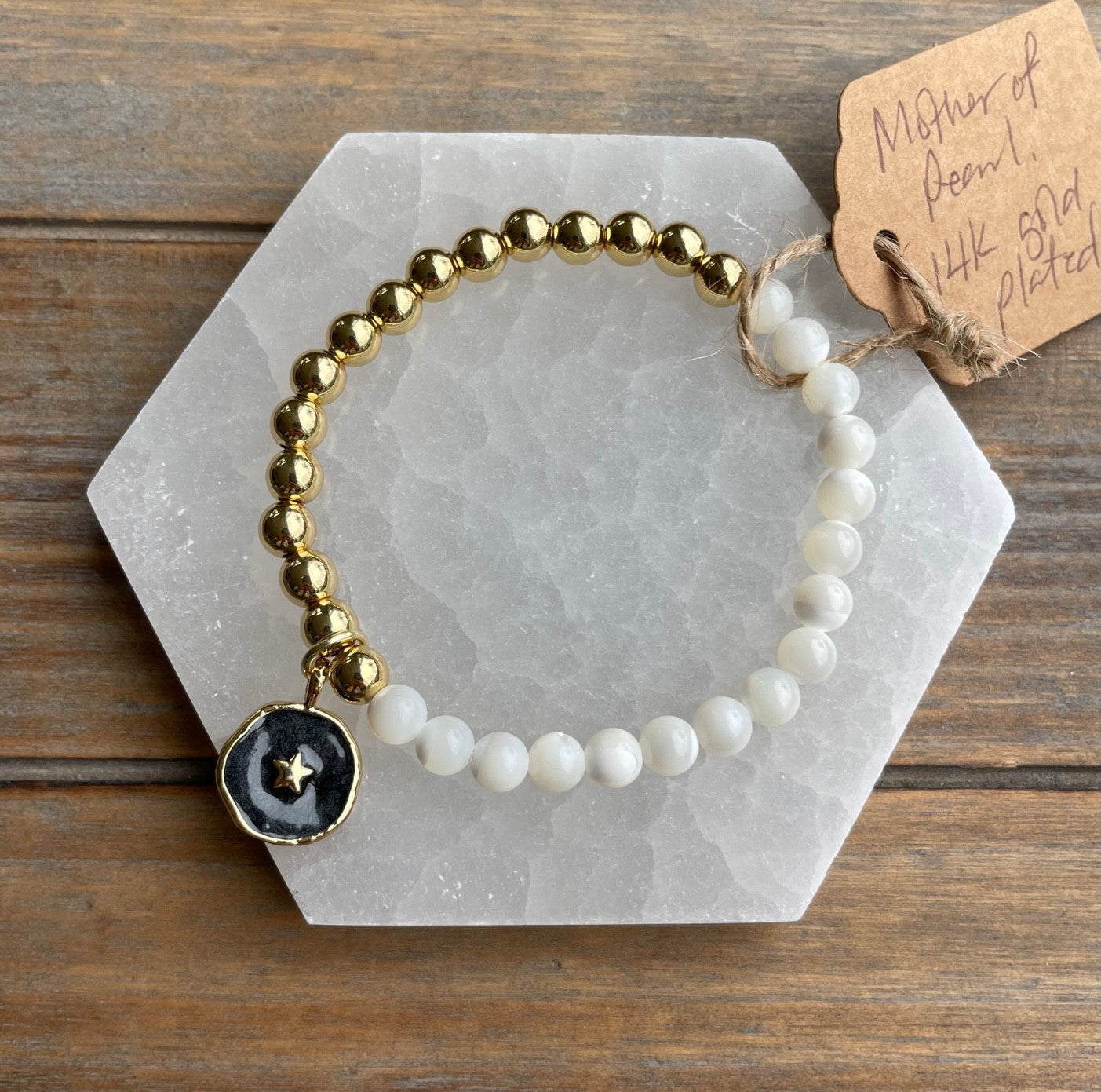Mother of Pearl and Gold Two-Tone Bracelet with Star Charm w/Black Background